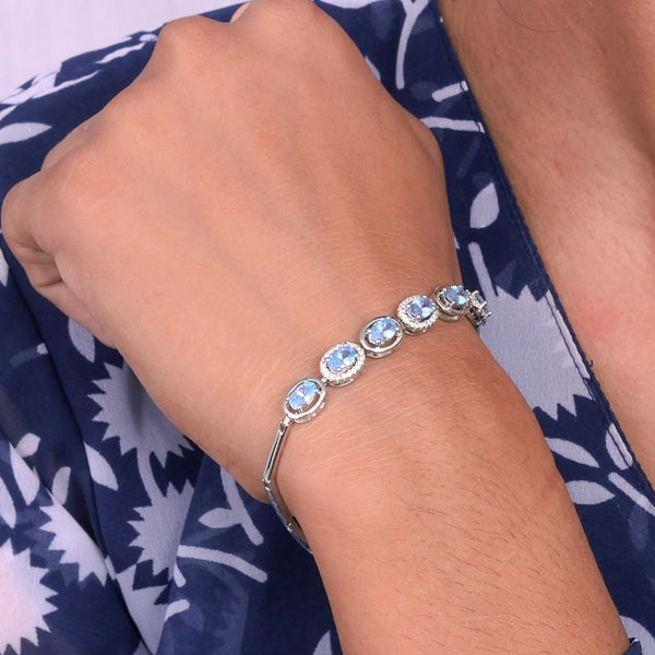 Silver & blue topaz tennis bracelet | OldJW Auctioneers
